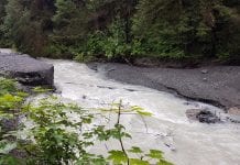 Washout on Power Creek Road exposes hydro transmission line
