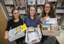 Hooking it up: UAA professors connect new teachers with classroom libraries Kathryn Ohle, assistant professor of early childhood education, and her project partner Jennifer McKay, assistant professor in the UAA/APU Consortium Library, along with their student assistant Tia Shira (center), spent the summer curating book collections for newly graduated UAA teachers. (Photo by James Evans / University of Alaska Anchorage)