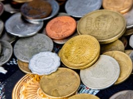 Entrepreneur coins new business idea An assortment of loose coins. On Friday, July 12, 2019, Russell Minor brought his handicrafts to the Salmon Jam festival for the first time. Photo by Zachary Snowdon Smith/The Cordova Times