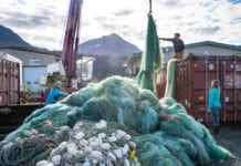 Picks and Pans: The best and worst in the 2021 seafood industry From left: Matt Doucett, Gerald McCune and Shae Bowman load loose fishing nets into a shipping container for recycling. (Oct. 3, 2019) Photo by Zachary Snowdon Smith/The Cordova Times