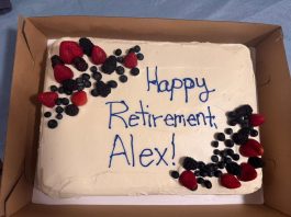 Russin rounds out tenure as school board approves balanced budget for next year